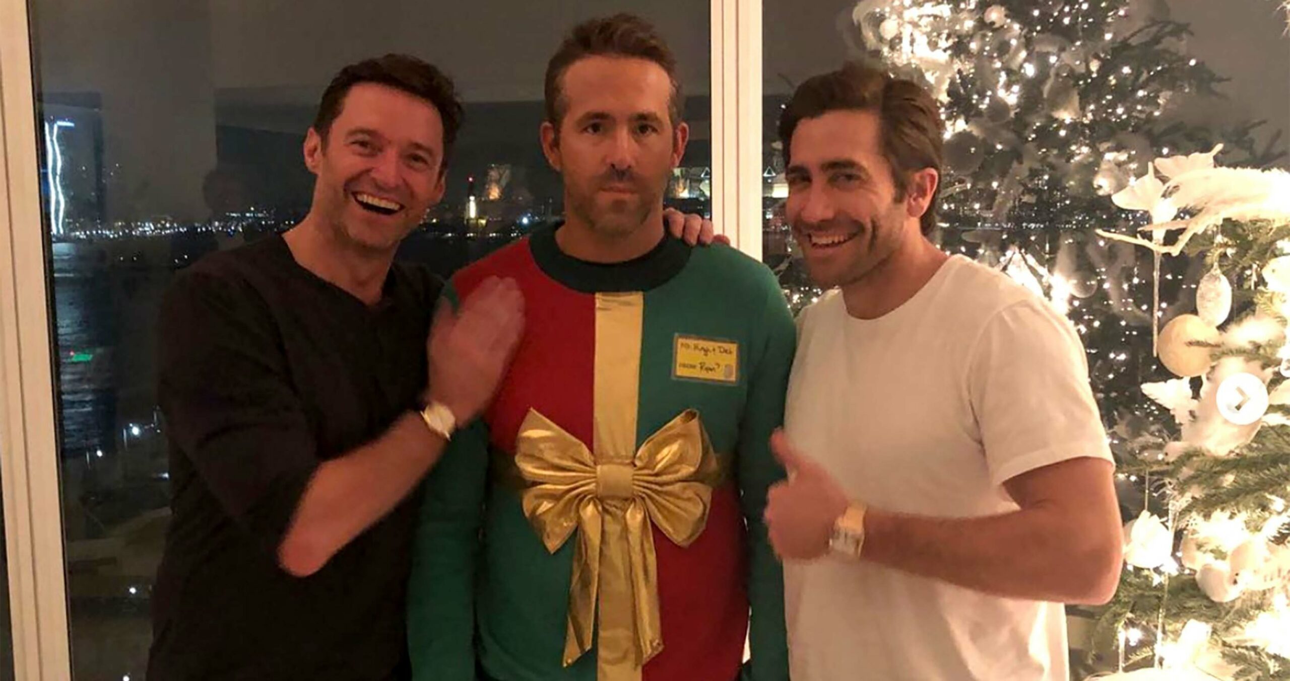 Ryan Reynolds with Hugh Jackman and Jake Gyllenhaal
